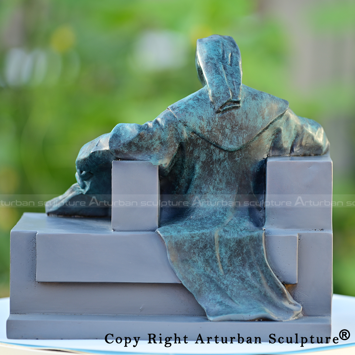 3 Statue of Anonymous back view with chair