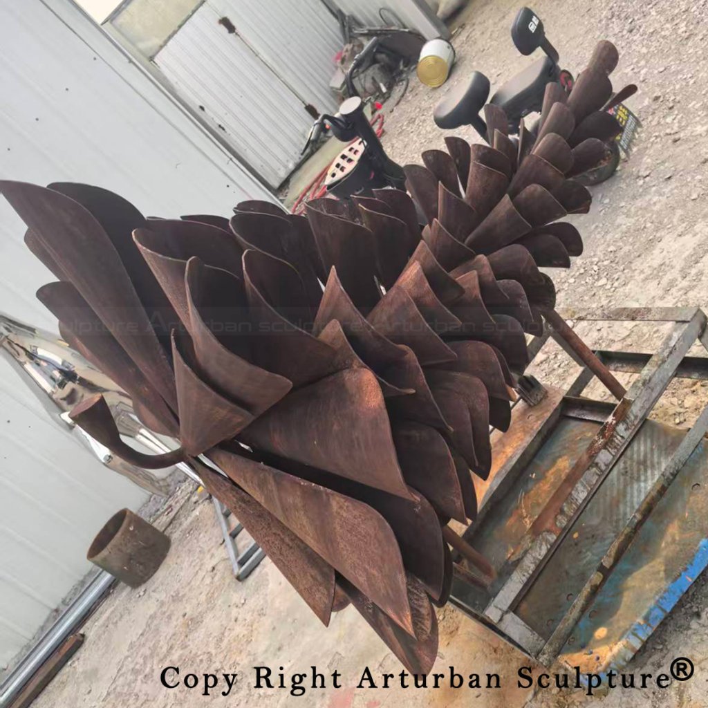 5 weathered metal pine cone sculpture