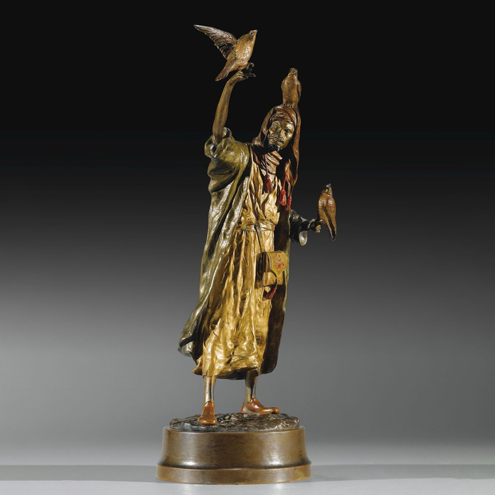 Bronze Bird Seller Statue and birds