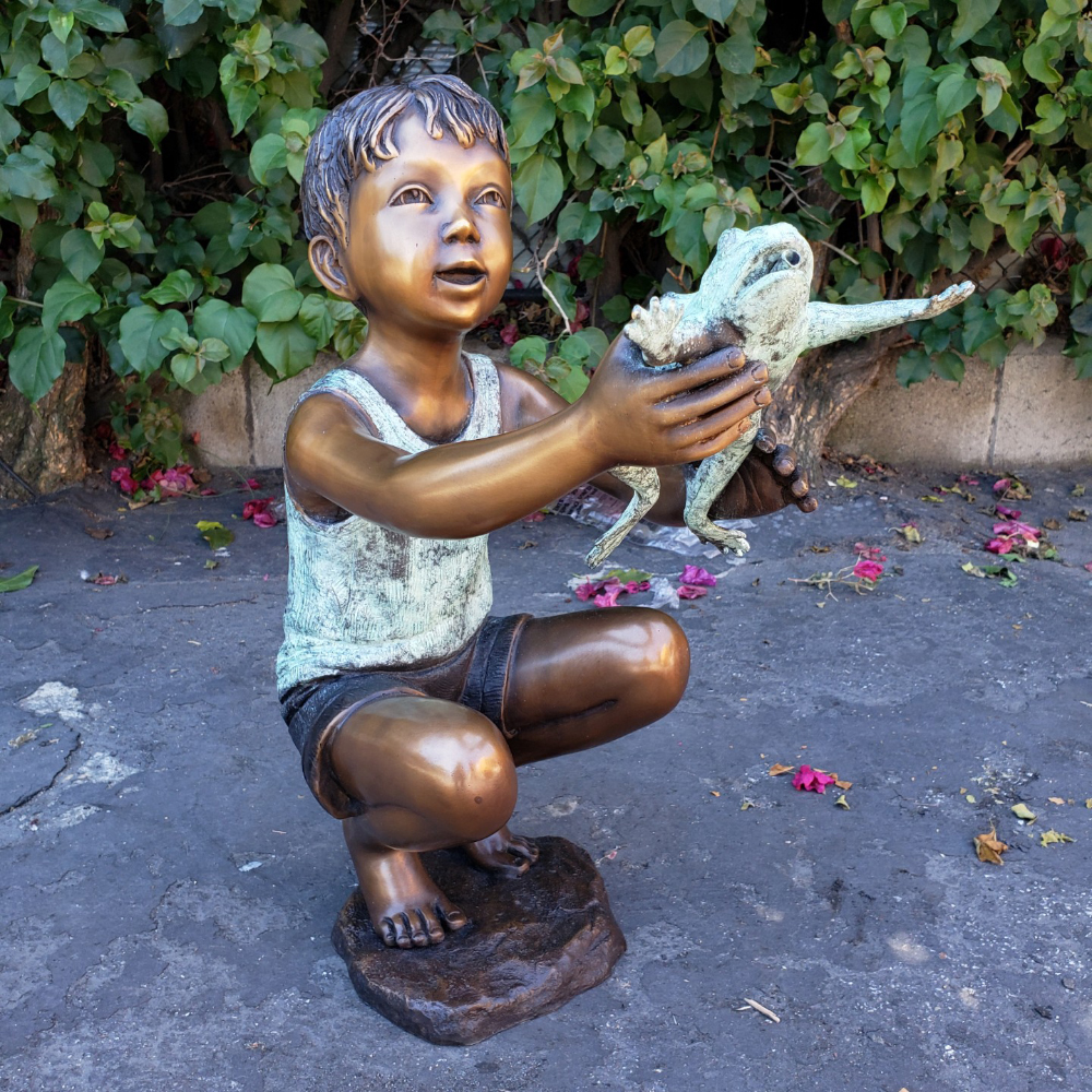Bronze Boy Holding Frog Statue in Garden