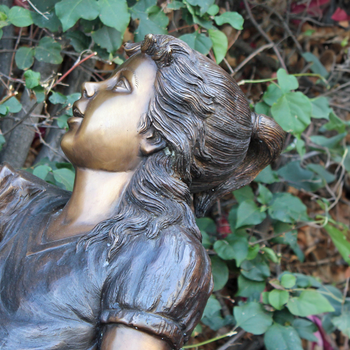 Bronze Girl Holding Birds Statue Close Detail