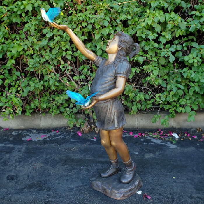 Bronze Girl Holding Birds Statue Side View