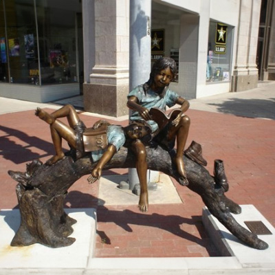 Bronze Outdoor Reading Children Sculpture front view