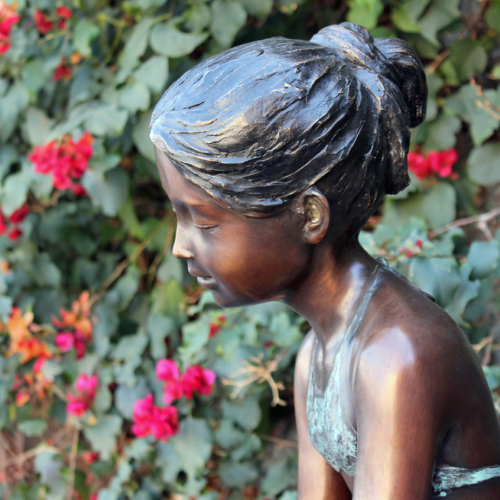 Bronze Sitting Girl Sculpture head detail