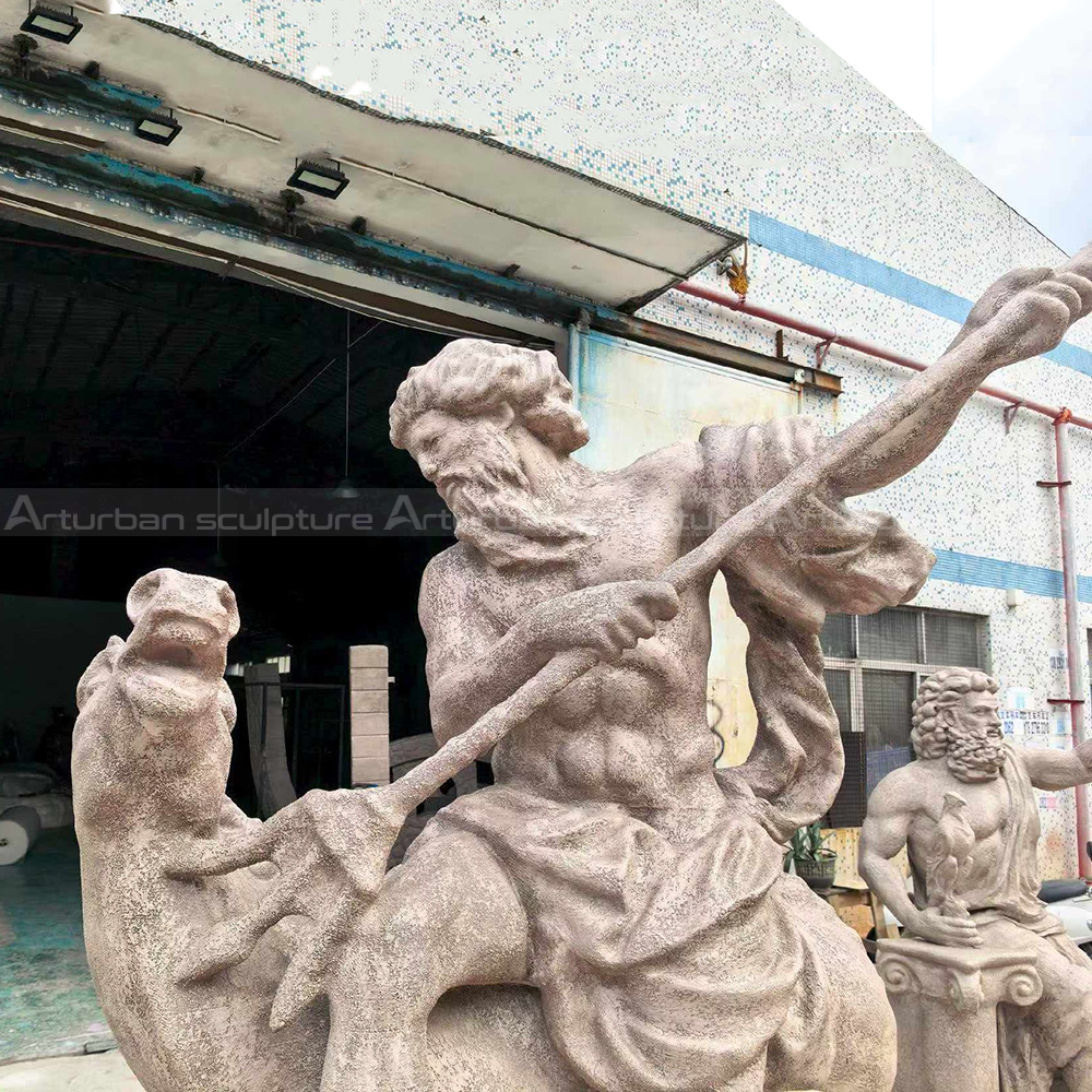 Fiberglass Neptune holding trident near sea horse
