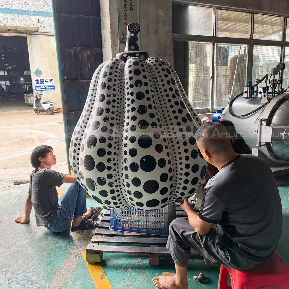 Fiberglasss outdoor pumpkin statue with polka dots