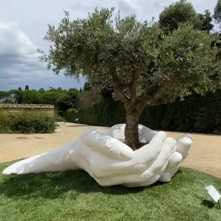 Hand Holding Tree Sculpture garden art