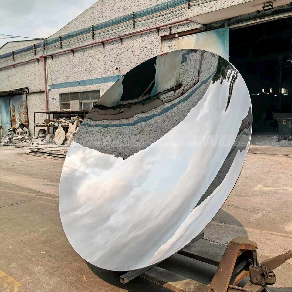Large stainless steel Kapoor Sky Mirror Sculpture