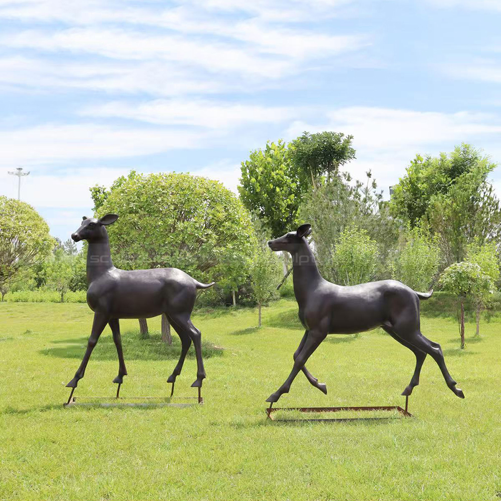 Two bronze Garden Deer Statues walking