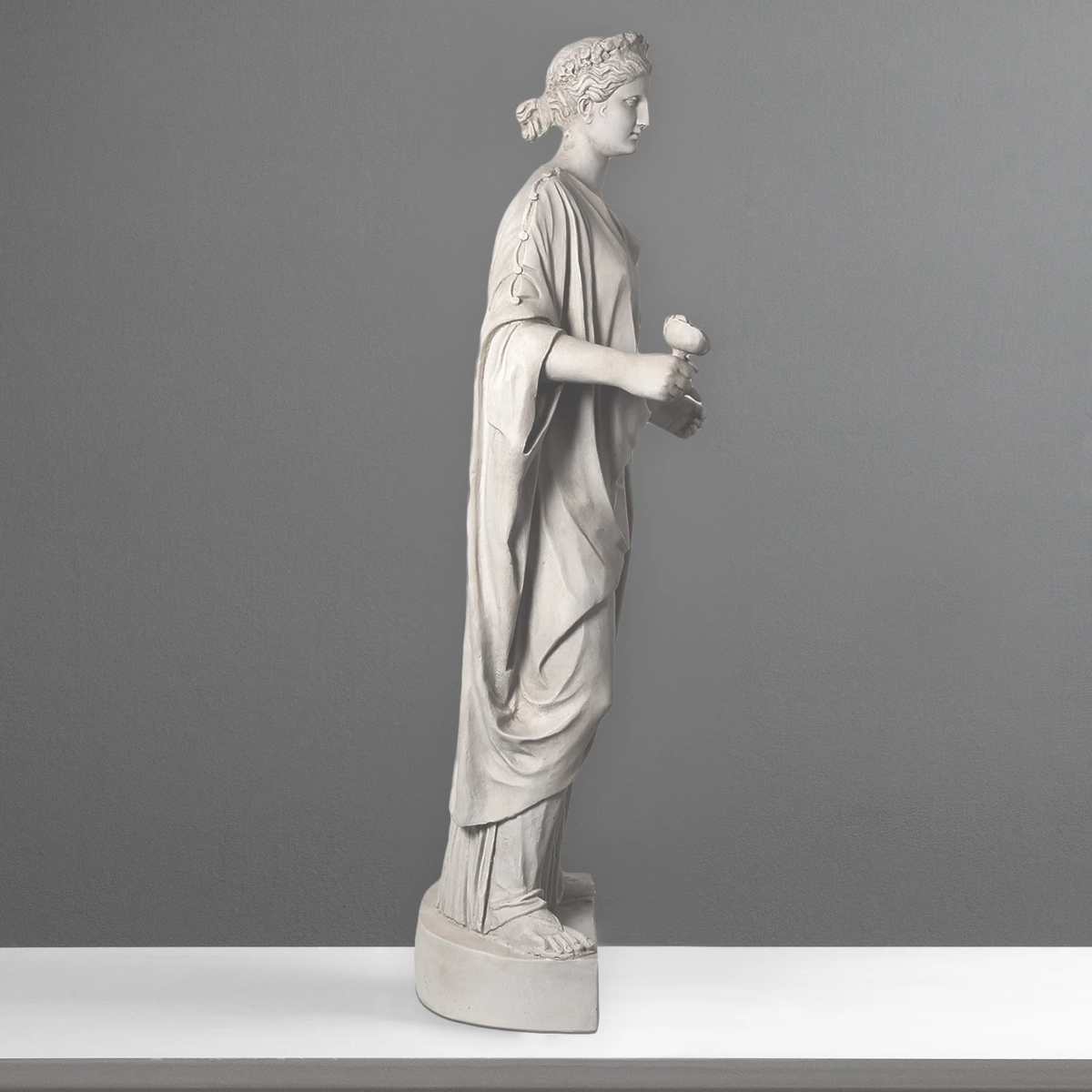 Venus marble statue holding rose