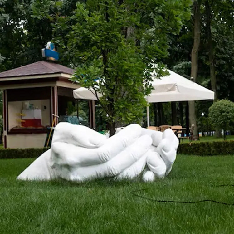 White marble Hand Holding Tree Sculpture