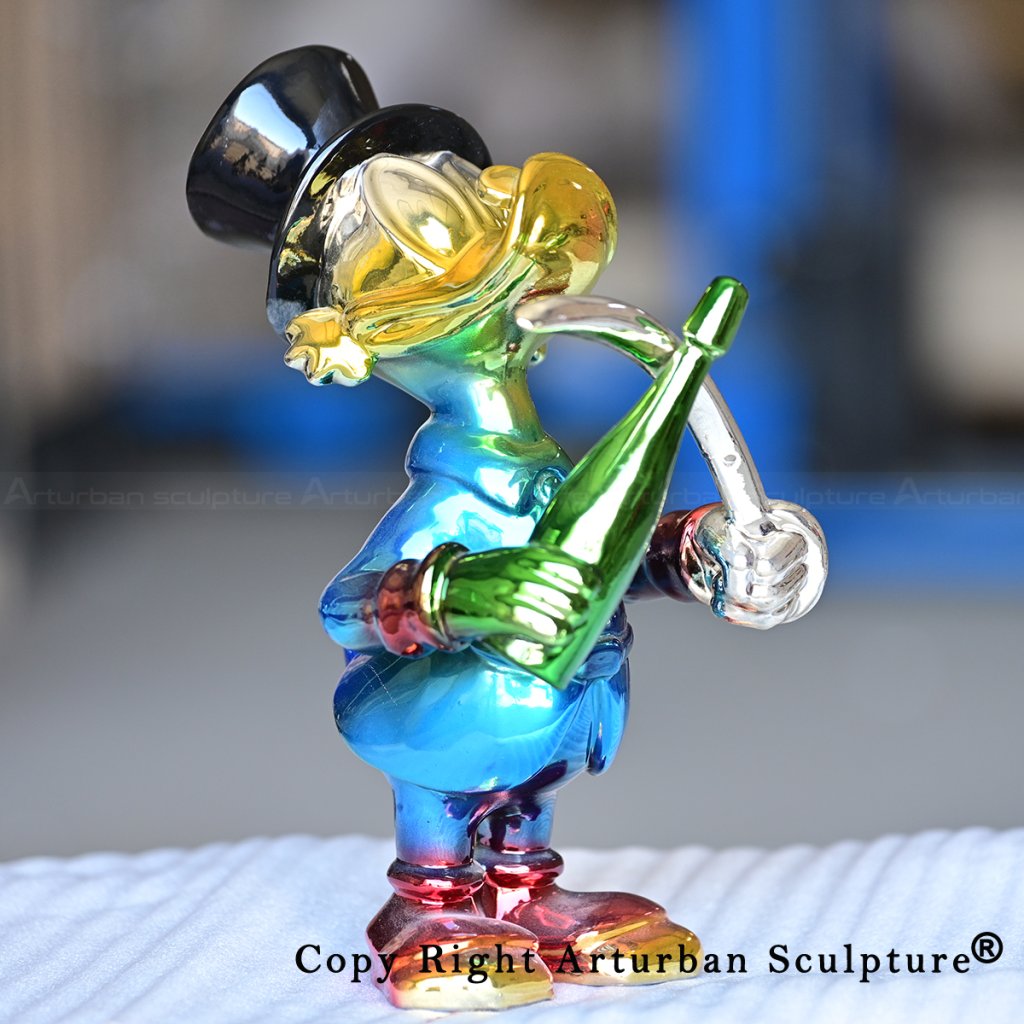 0 Uncle Scrooge Figurine holding champagne sword