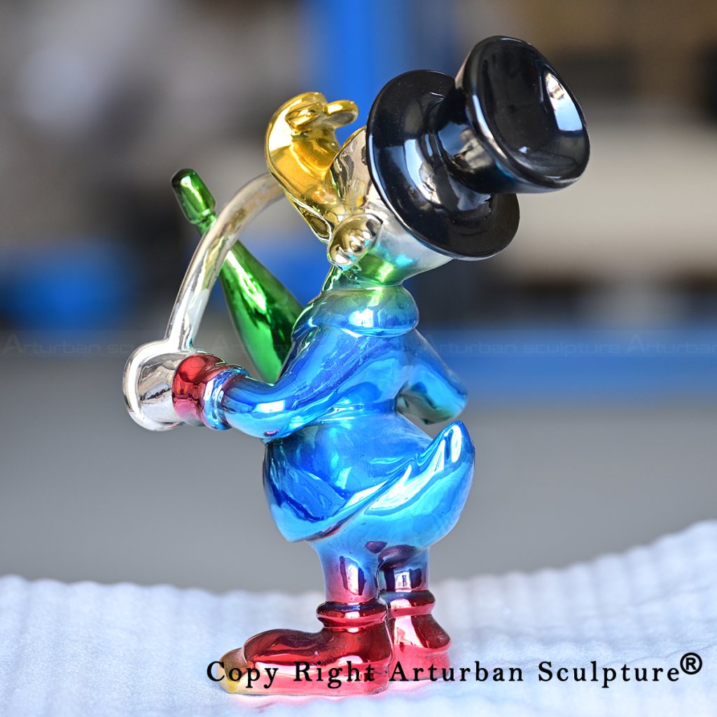 3 Bronze Scrooge duck sculpture