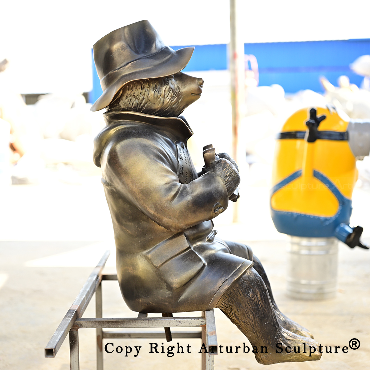 5 Fiberglass Paddington Bear Sculpture shown from side