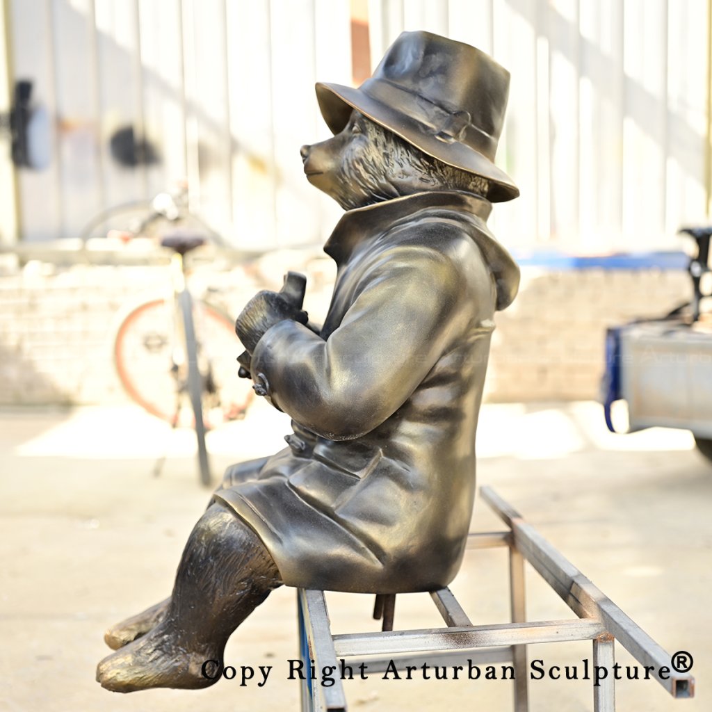 7 Seated Paddington Bear Statueside view with dangling legs