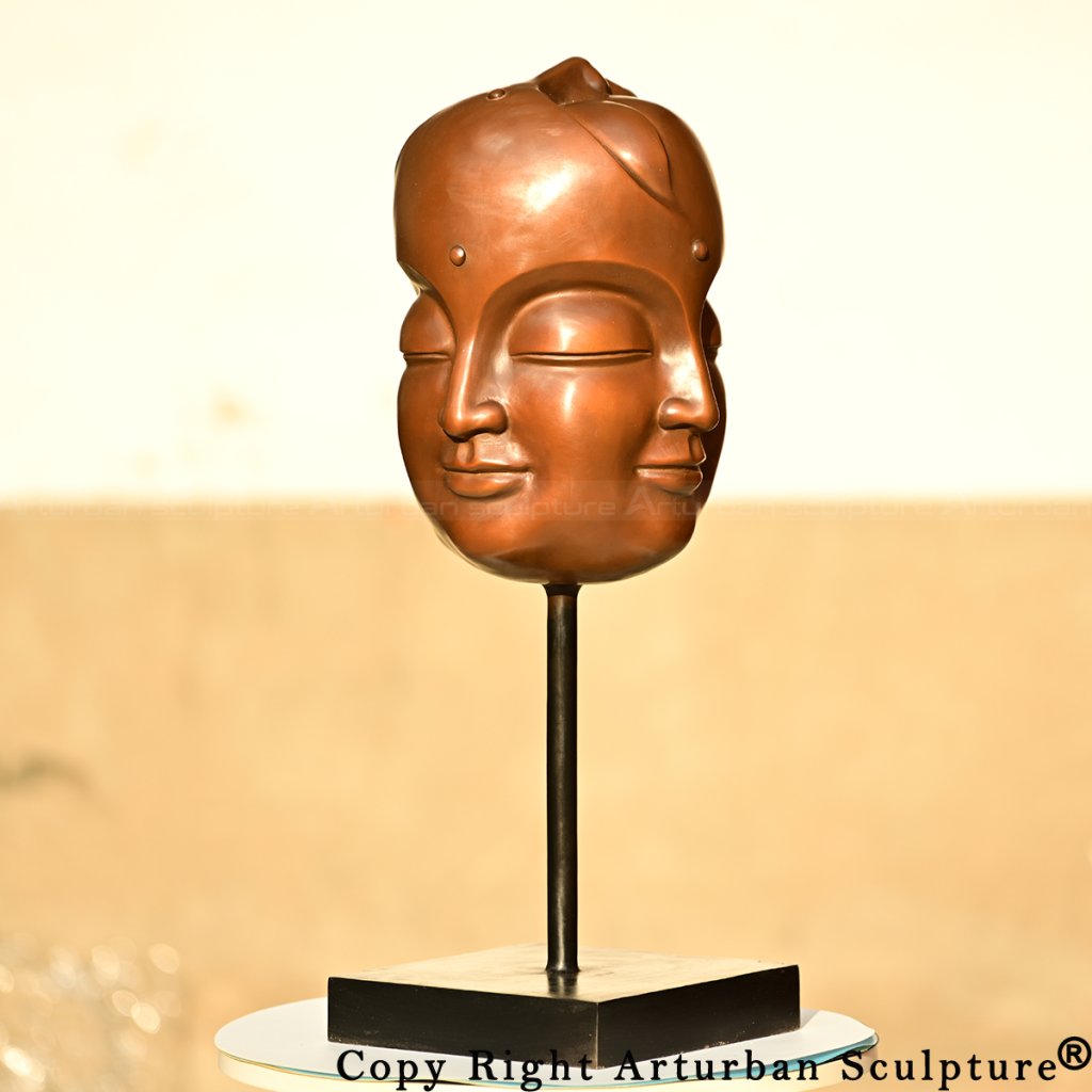 Bronze 5 faced buddha head side view
