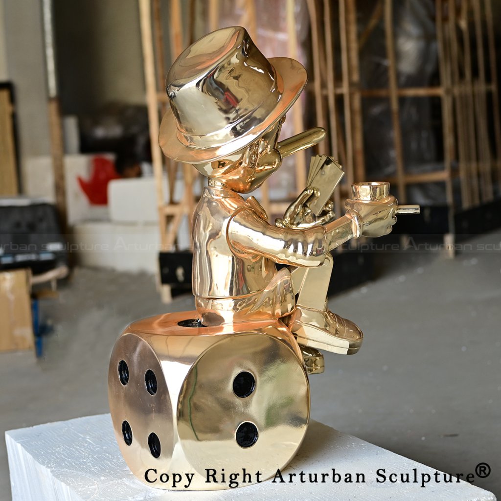 8 bronze Pinocchio statue seated on dice
