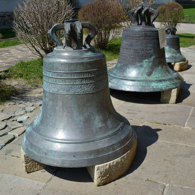Antique giant church bell with green patina