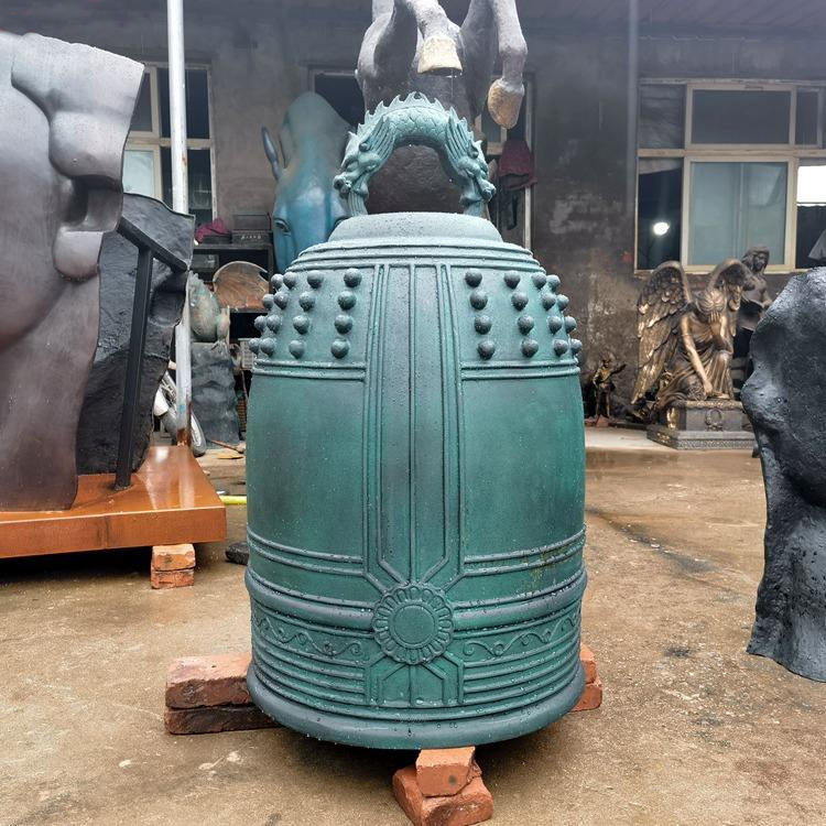 Antique japanese buddhist temple bell with dragon handle
