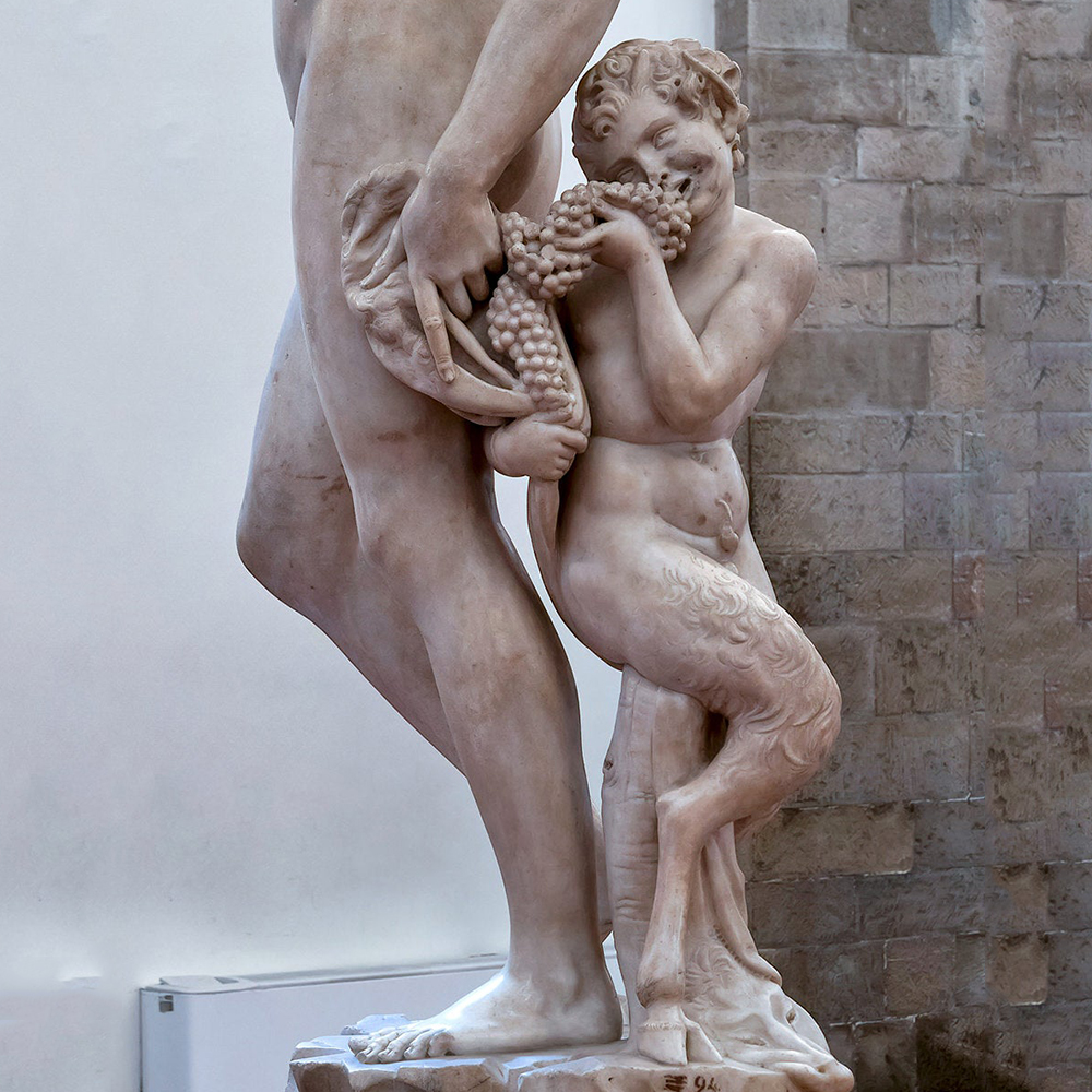 Bacchus sculpture with satyr detail