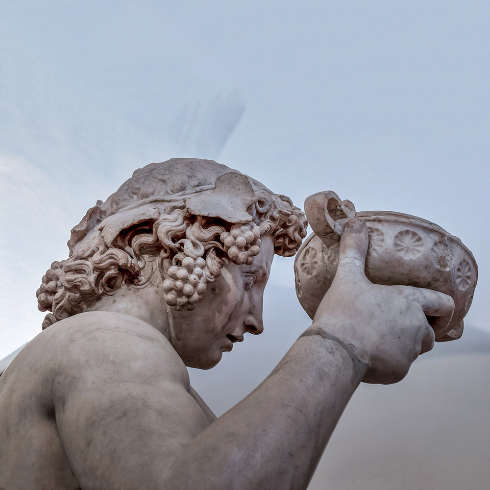 Bacchus wine cup sculpture detail