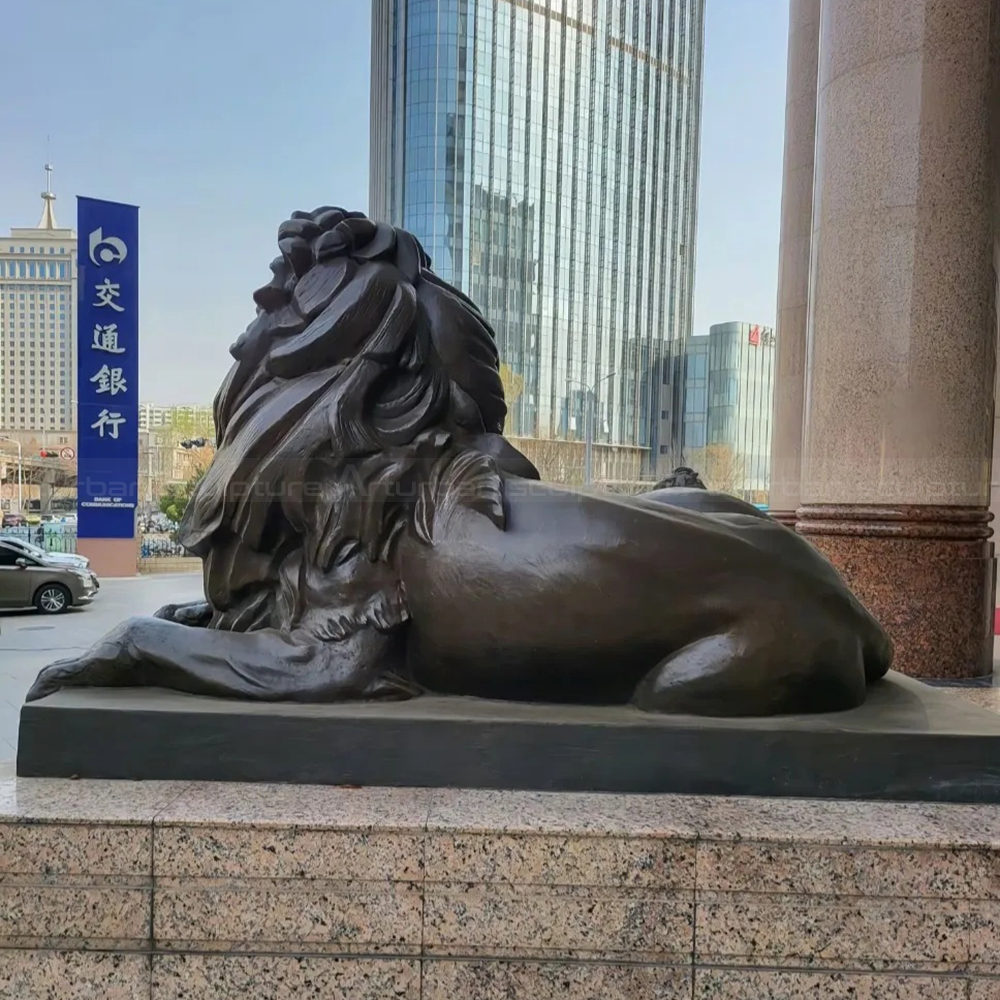 Bronze Lion Entry Statues beside building