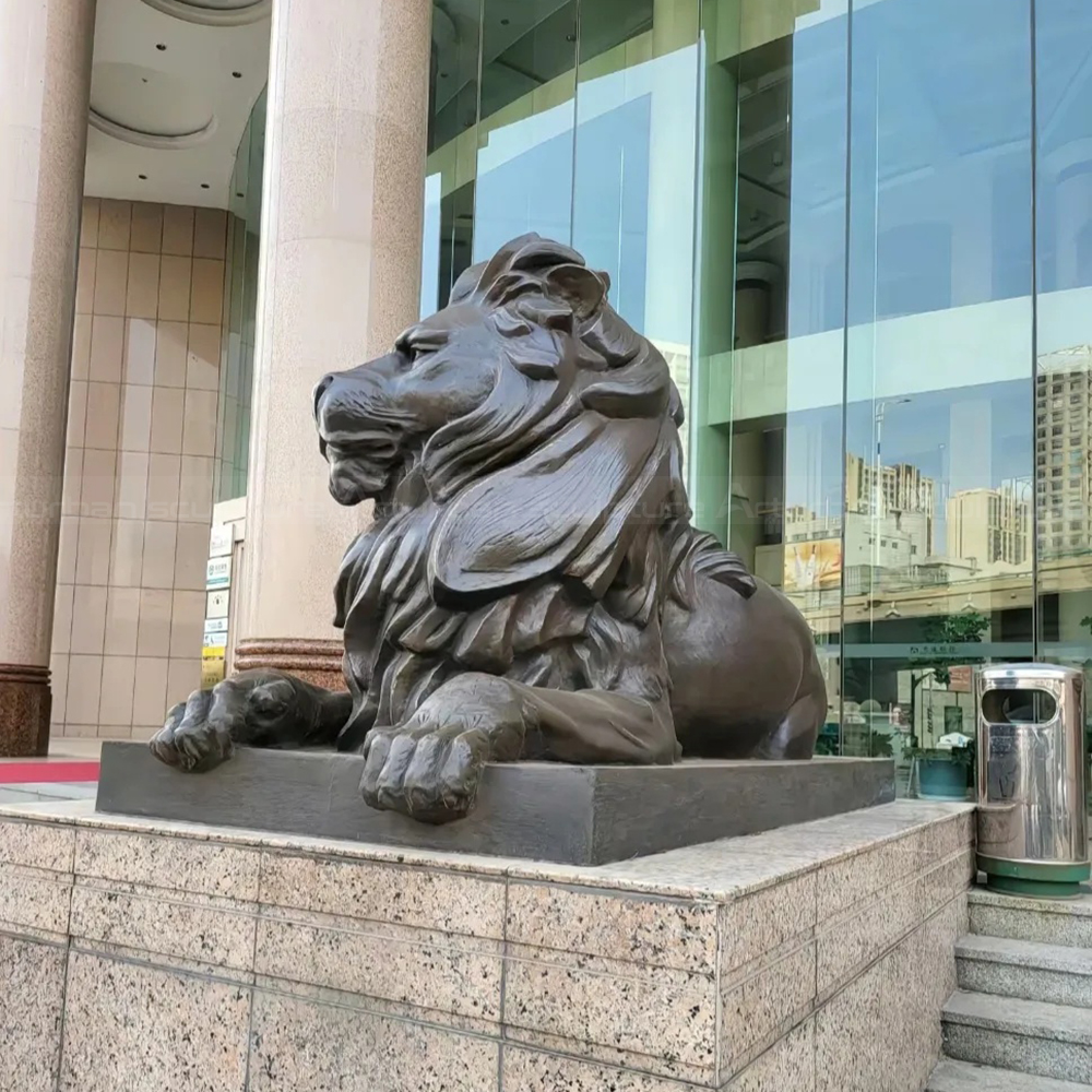 Bronze Lion Entry Statues reclining on pedestal