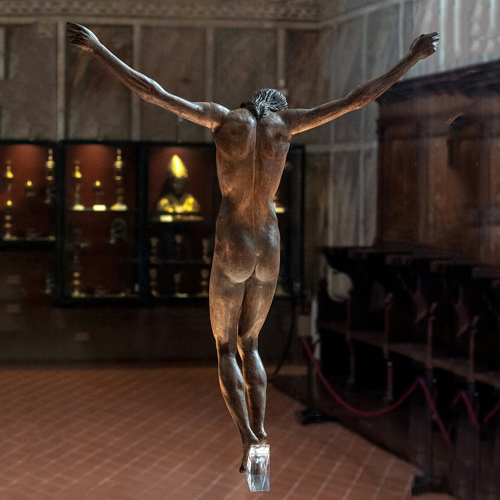 Christ figure with outstretched arms