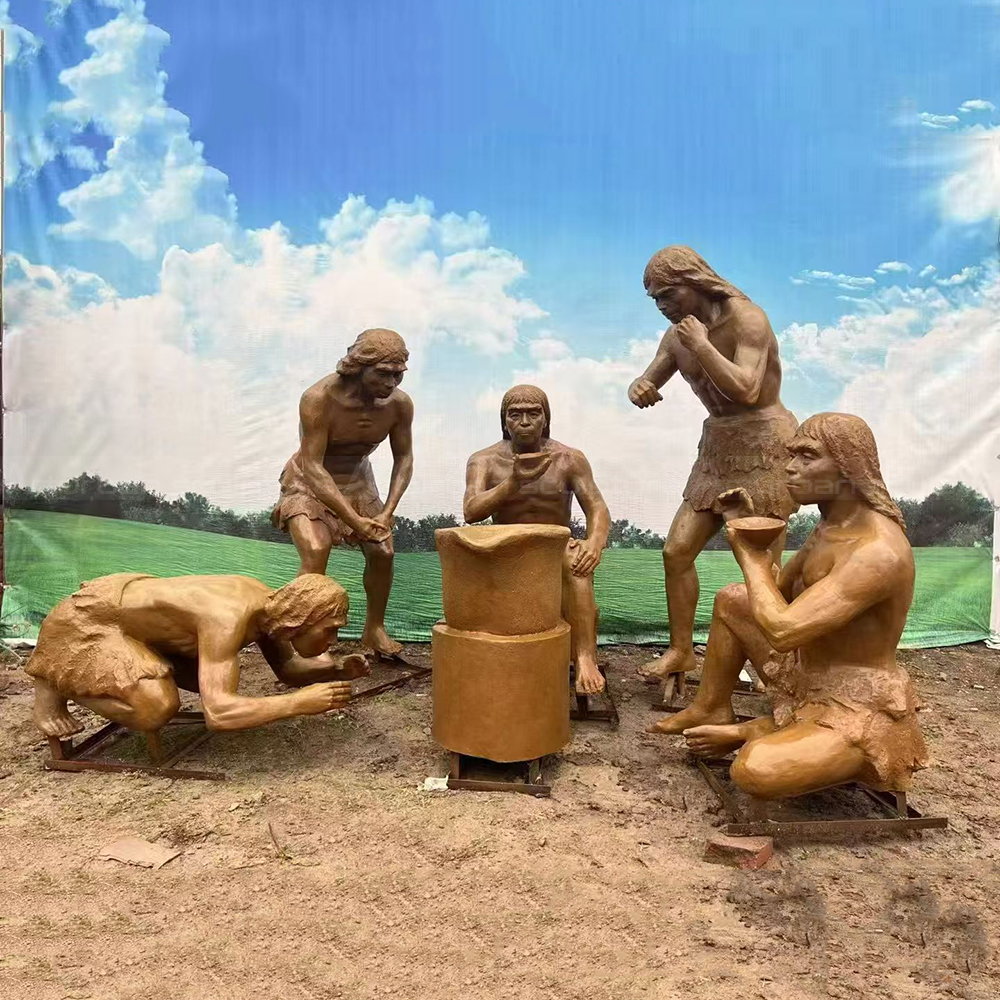 Fiberglass Caveman Sculpture group preparing food together