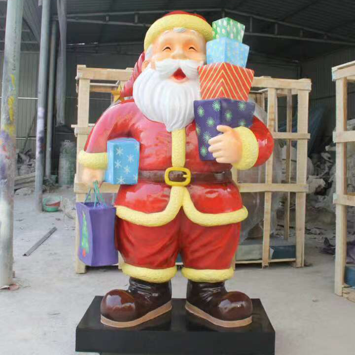 Fiberglass Santa Statue Decoration holding colorful Christmas gifts