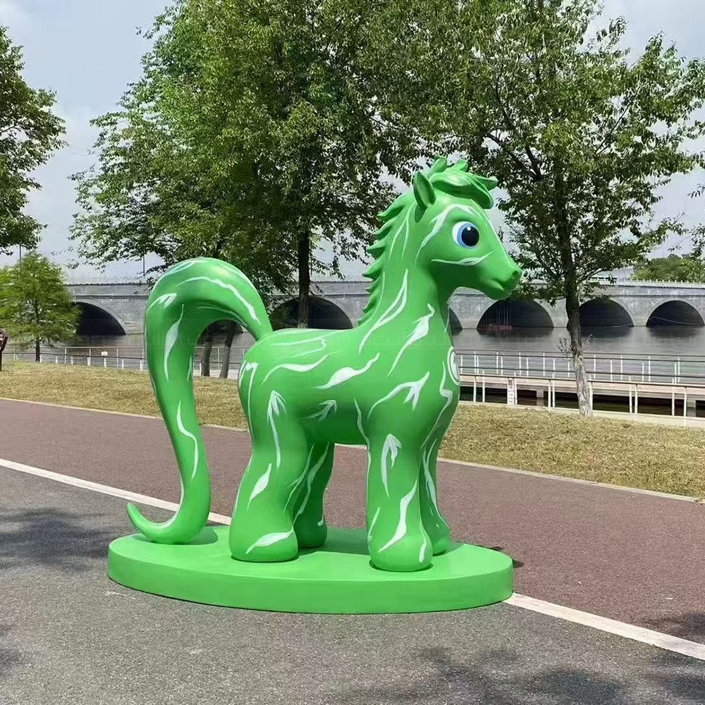 Green fiberglass Cute Horse Statue beside river