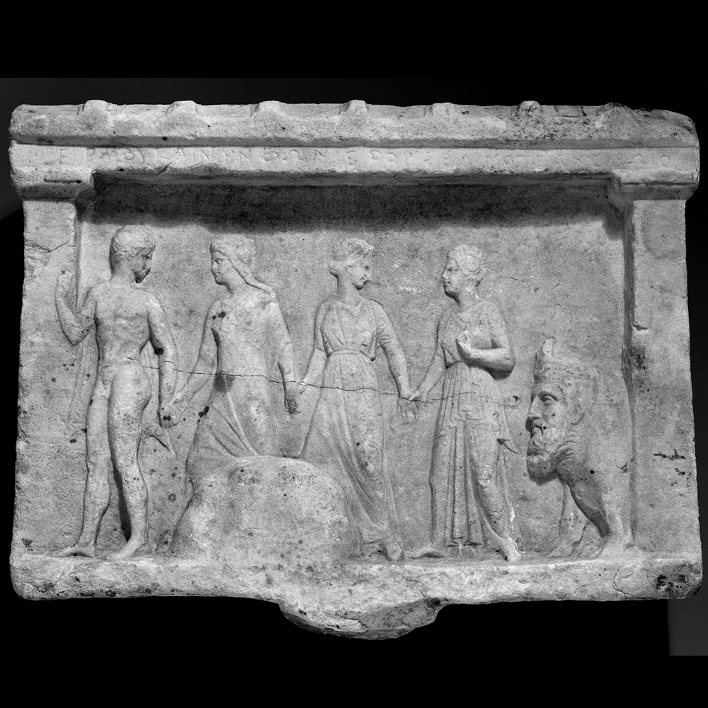 Hermes and three Nymphs in marble relief