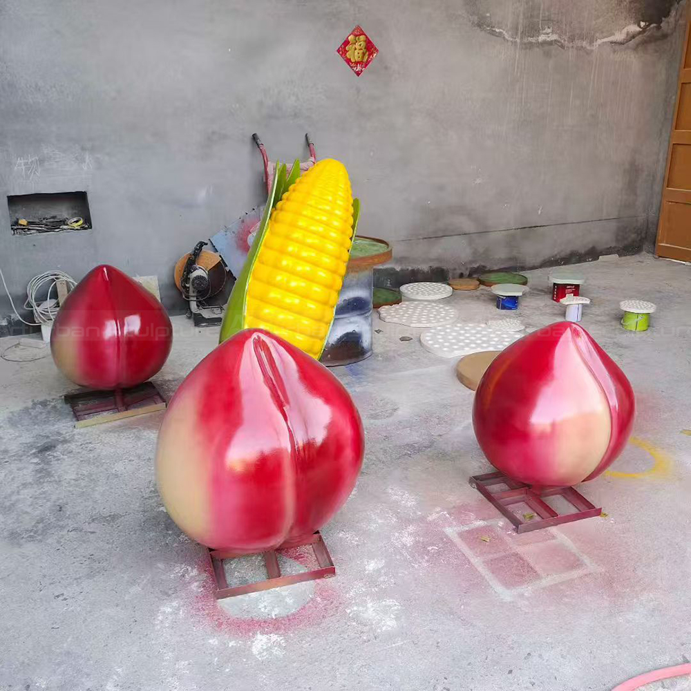Peach and fiberglass Giant Fruit Sculpture display