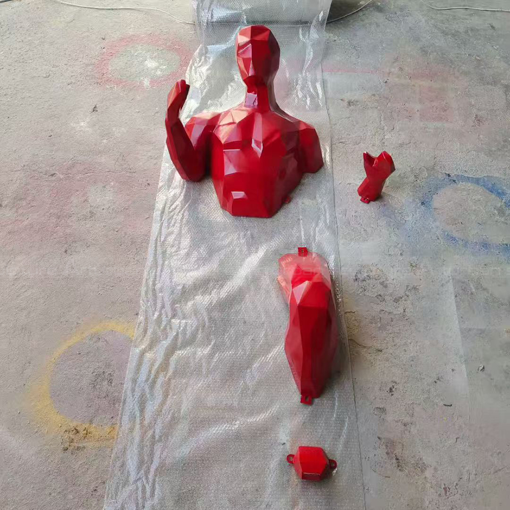 Red fiberglass Human Wall Sculpture separated parts