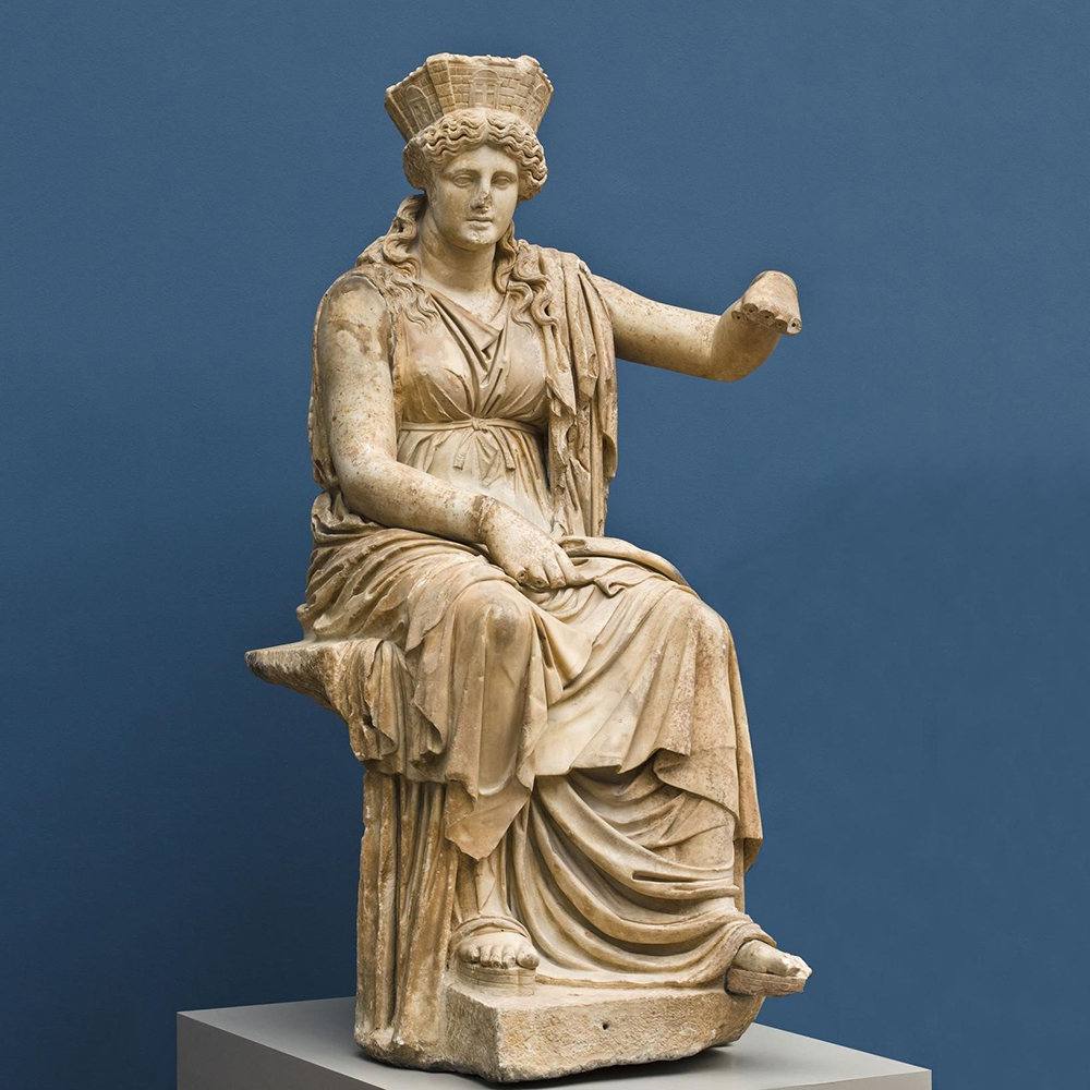 Rhea seated with crown in ancient statue