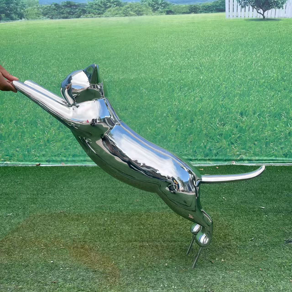 Stretching stainless steel cat yard statue outdoors