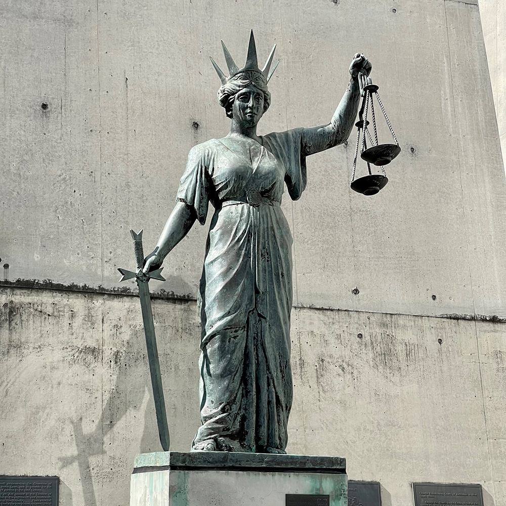 Themis statue holding scales and sword