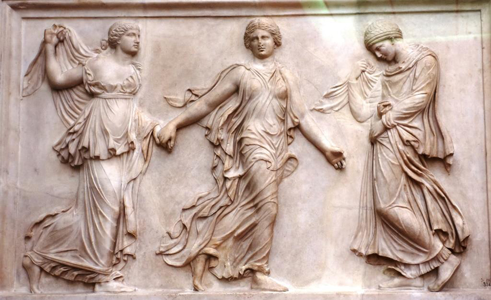 Three Horae dancing in ancient Roman relief