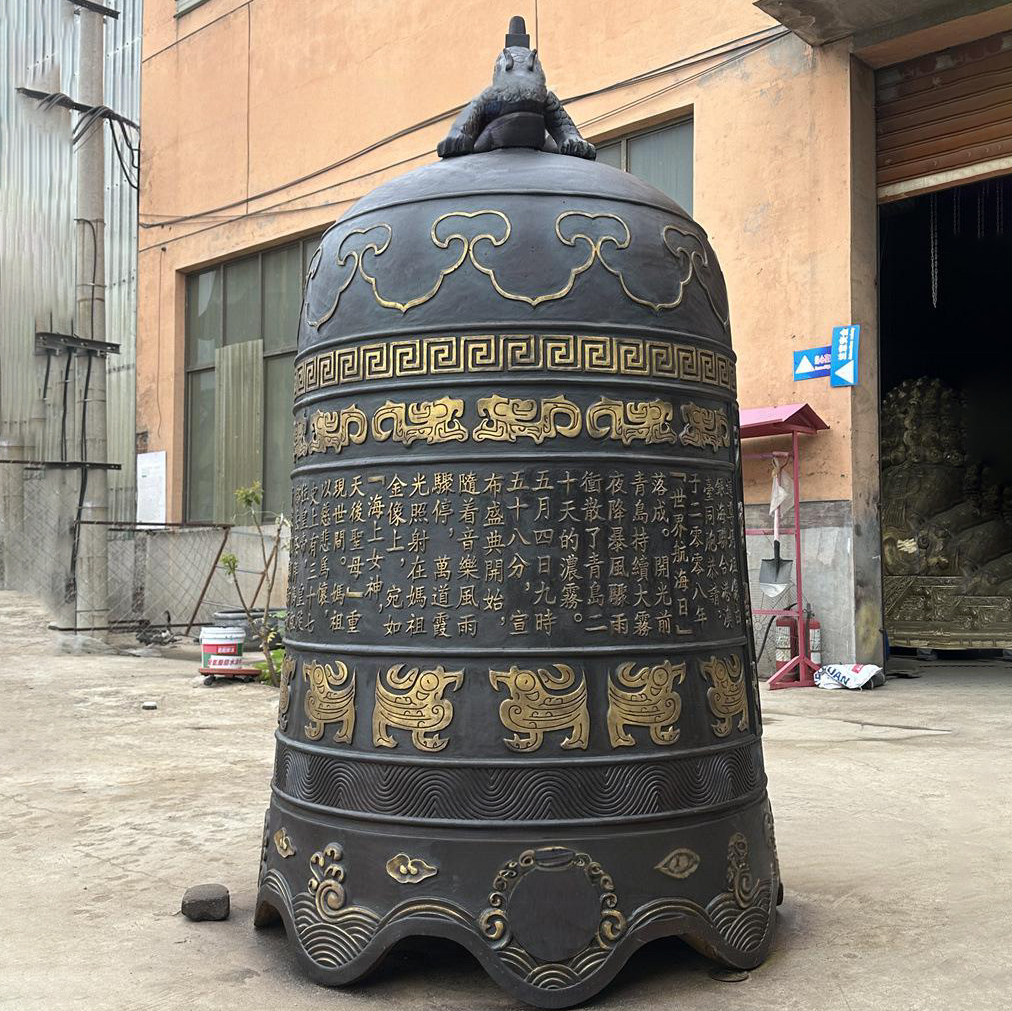 Traditional asian temple bell with ornate bronze patterns