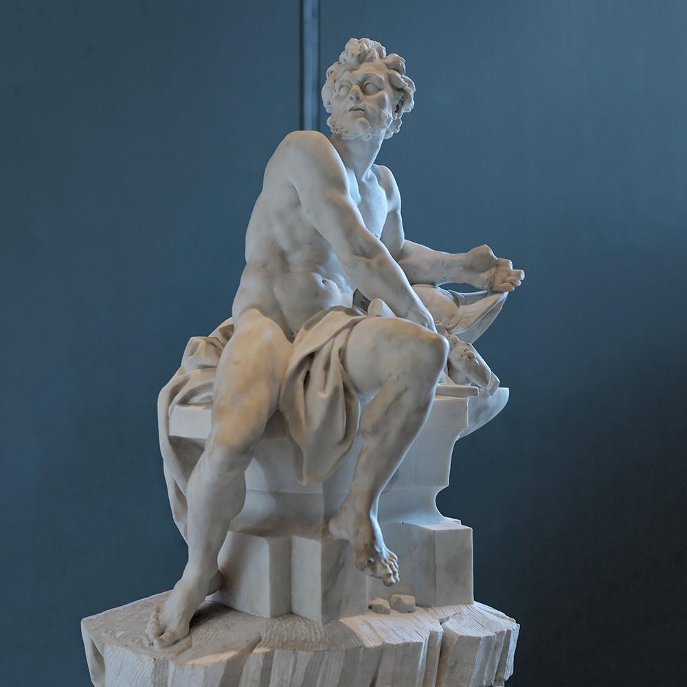 Vulcan marble statue forging at anvil