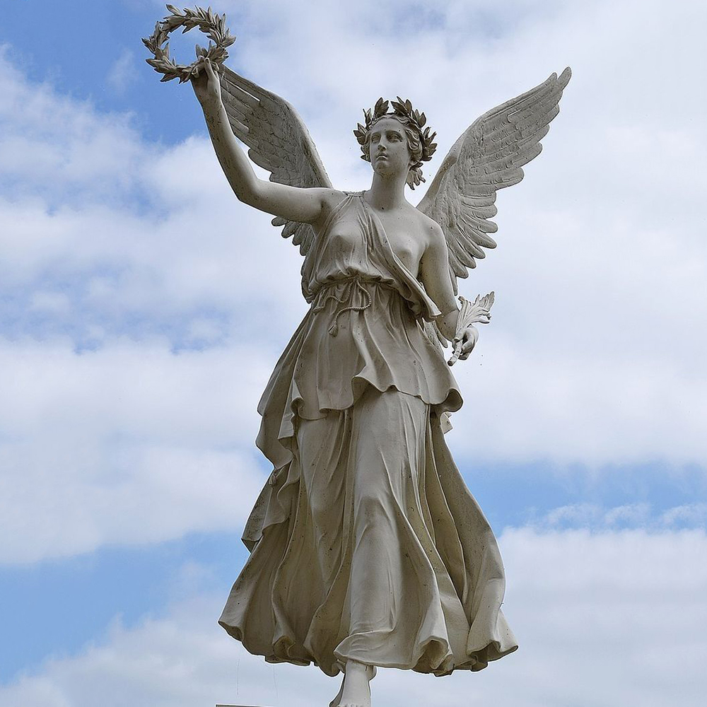 Winged Nike statue holding laurel wreath