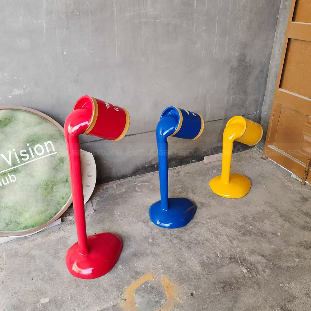 three fiberglass Paint Can Statue