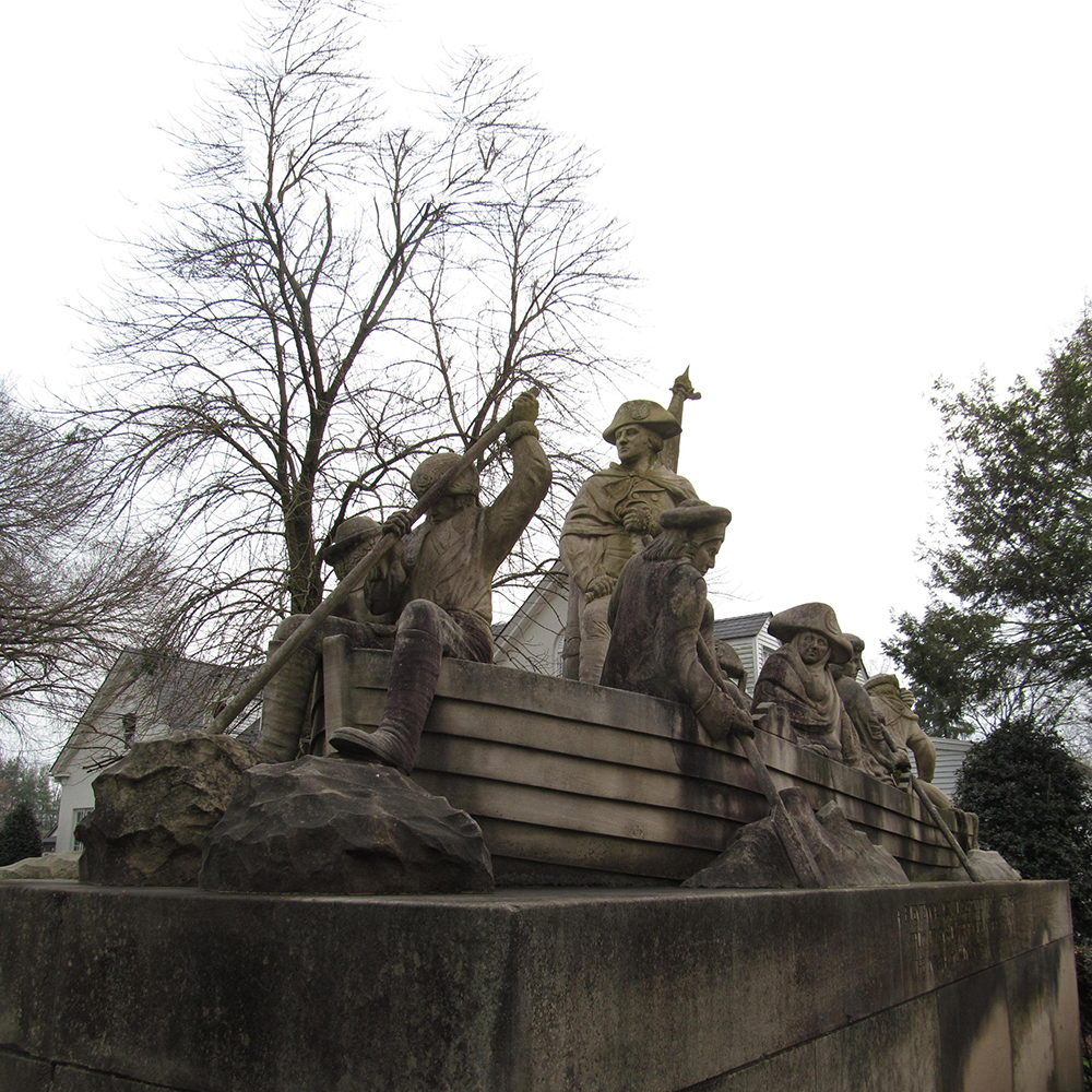 Angled view of limestone crossing monument