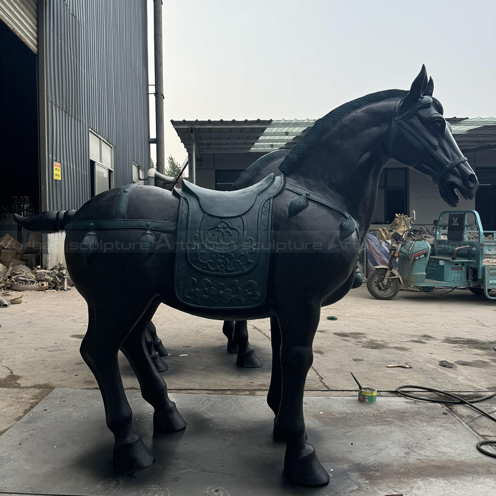Antique Bronze Horse Sculptures with ornate saddle
