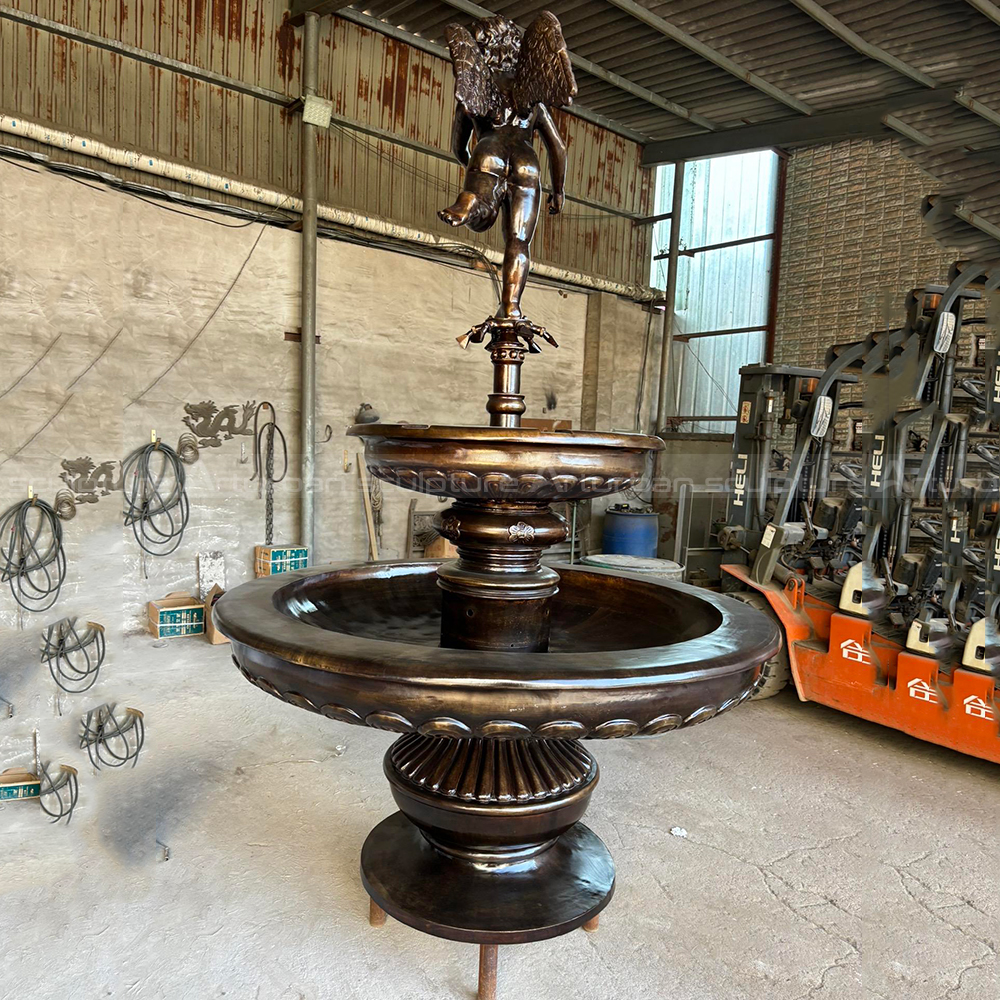 Bronze Cherub Fountain with cherub on the top