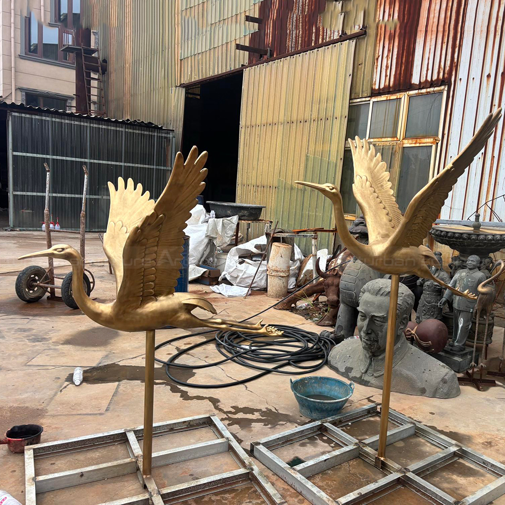Bronze Crane Yard Statue with raised wings