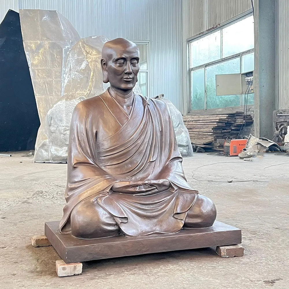 Bronze Monk Statue seated in meditation pose
