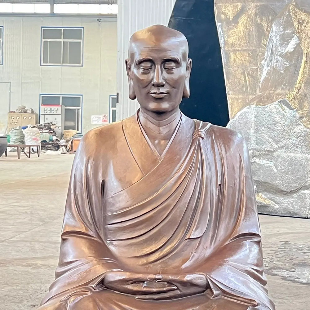 Bronze Monk Statue with detailed robe folds