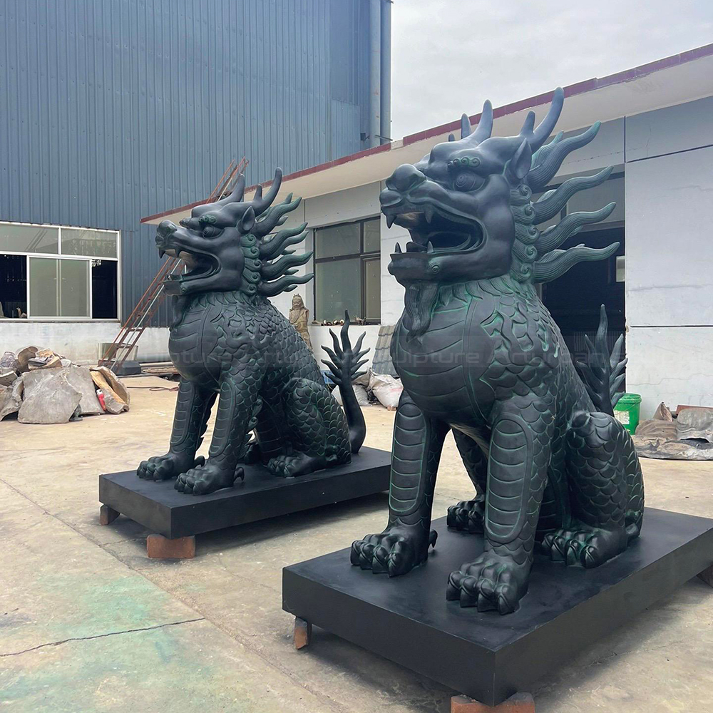 Bronze Qi Lin Statue pair with raised manes