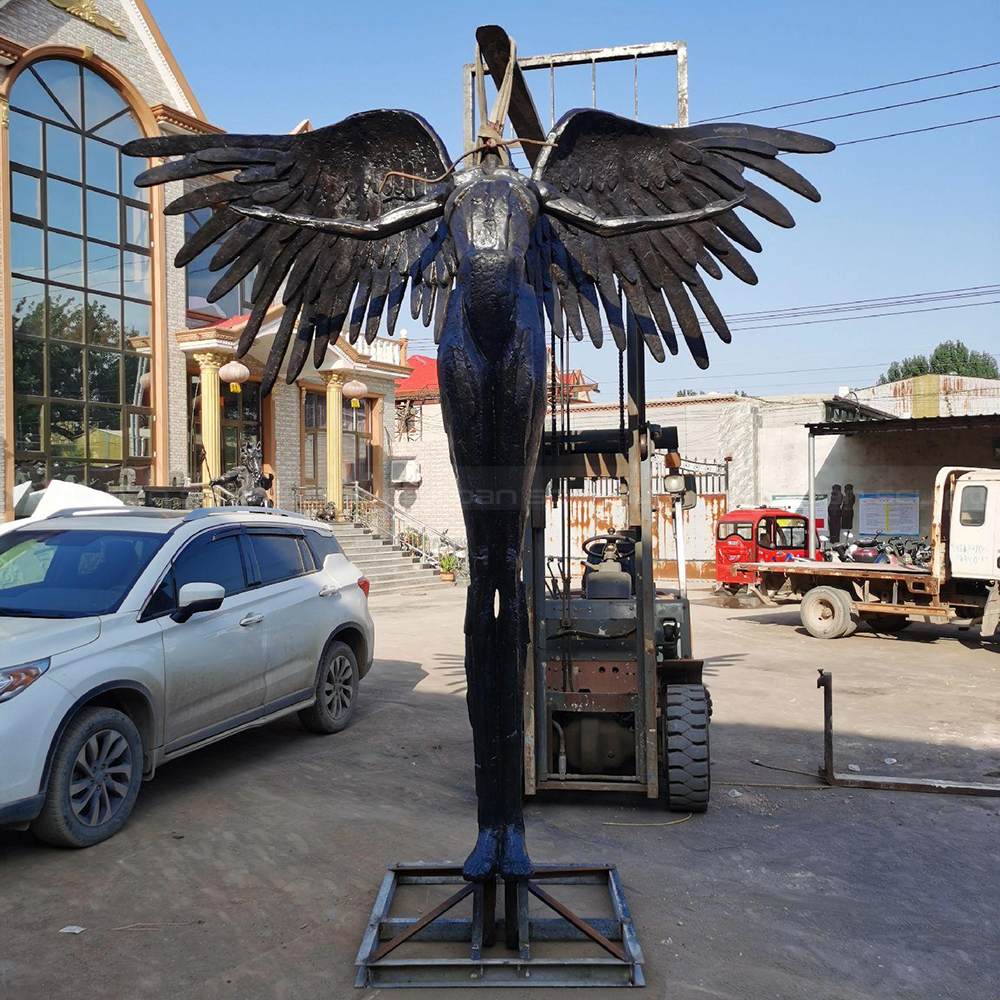 Bronze Winged Figure Sculpture centered frontal view